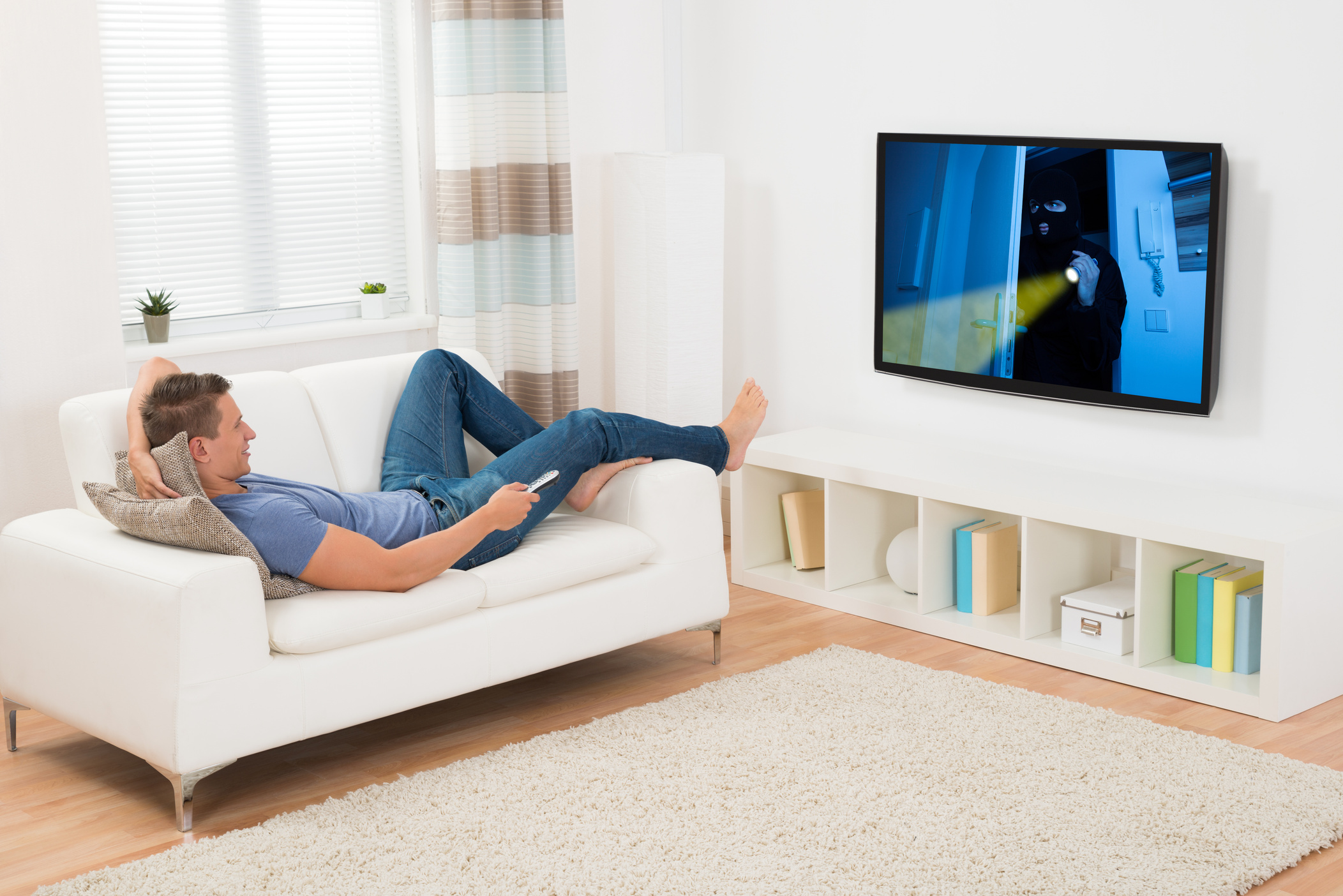 Man Watching Movie On Television